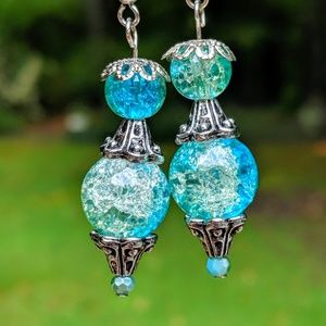 Beautiful teal colored crackle glass bead earrings